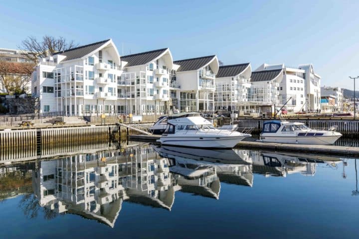Modern hotel with mirror-like fjord and marina, Molde Fjordhotell, Classic Norway Hotels.